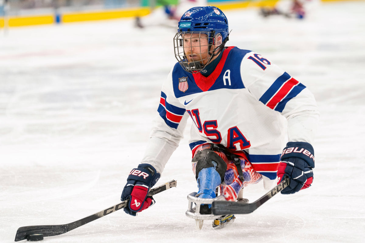 Team USA’s Declan Farmer (#16) handles the puck during the Gold medal game against Team Canada during the Milano-Cortina 2026 Paralympic Winter Games at Milano Santagiulia Ice Hockey Arena on March 15, 2026. Drew Garrison / USA TODAY Network
