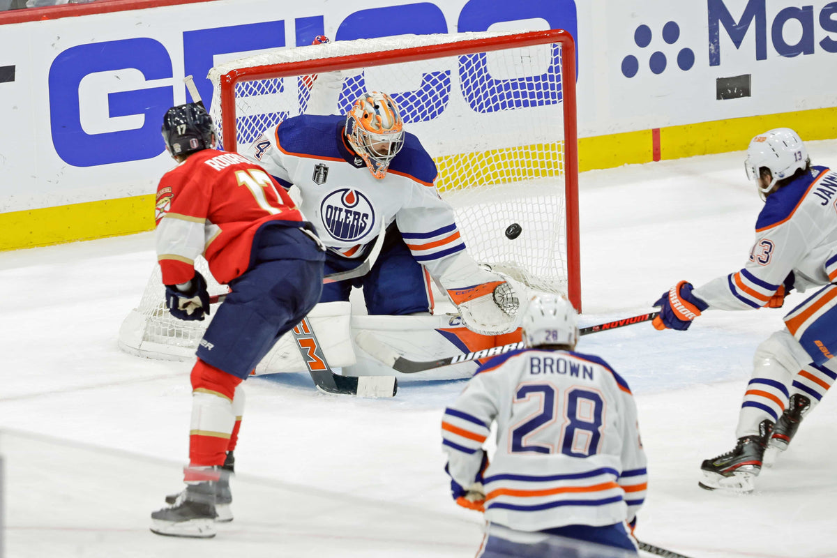 Florida Panthers center Evan Rodrigues scores a goal against Edmonton Oilers goalie Stuart Skinner during the third period of Game 2 of the 2024 Stanley Cup Final at Amerant Bank Arena in Sunrise on June 10, 2024.