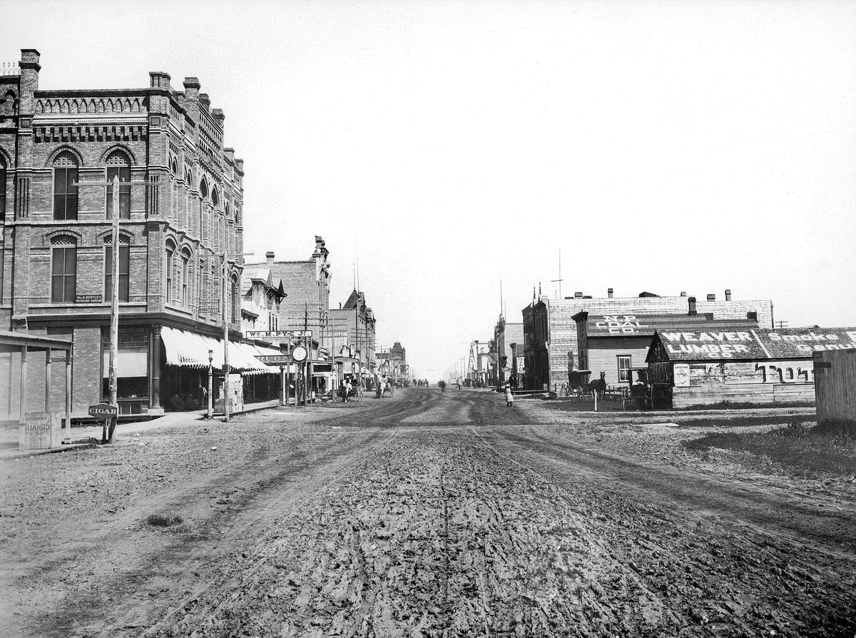 Dakota block of downtown Bismarck looking east before the devastating fire of 1898. Courtesy State Historical Society of North Dakota / #00022-H-00049