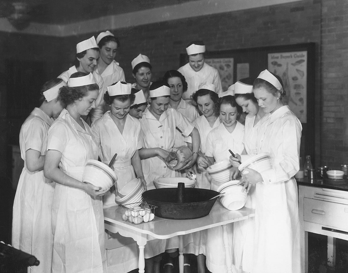 A group of women prepare ingredients for baking during George Washington's birthday celebration in Fredericksburg, 1936. Courtesy Library of Virginia, Chamber of Commerce Collection