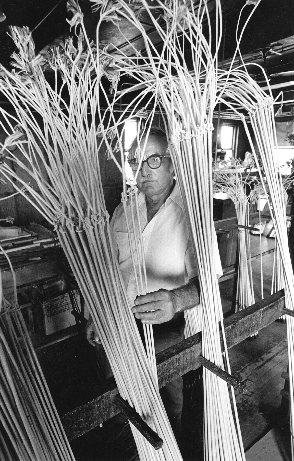 Angelo Curro of Westfield looks at completed whips. Courtesy Dave Roback/The Republican