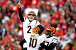 Cincinnati Bengals kicker Evan McPherson (2) is embraced by Cincinnati Bengals punter Kevin Huber (10) after kicking the game-winning field goal in overtime in the AFC championship NFL football game, Sunday, Jan. 30, 2022, at GEHA Field at Arrowhead Stadium in Kansas City, Mo. Cincinnati Bengals defeated Kansas City Chiefs 27-24. Sam Greene/The Enquirer