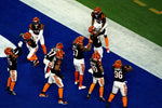 Cincinnati Bengals cornerback Chidobe Awuzie (22) celebrates with other defenders after intercepting a pass in the second half during Super Bowl 56, Feb. 13, 2022. Albert Cesare/The Enquirer