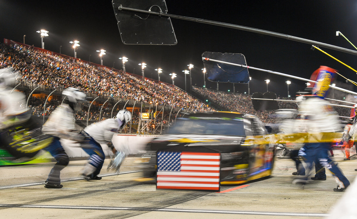 Pit crews work to service their cars during the 70th running of the Bojangles’ Southern 500 at Darlington Raceway. CourtesyMorning News