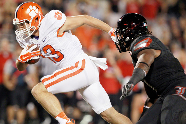 Clemson receiver Hunter Renfrow (13) scores a touchdown on a pass from quarterback Deshaun Watson (4) during the 1st quarter in Louisville on Thursday. Sefton Ipock / Anderson Independent Mail