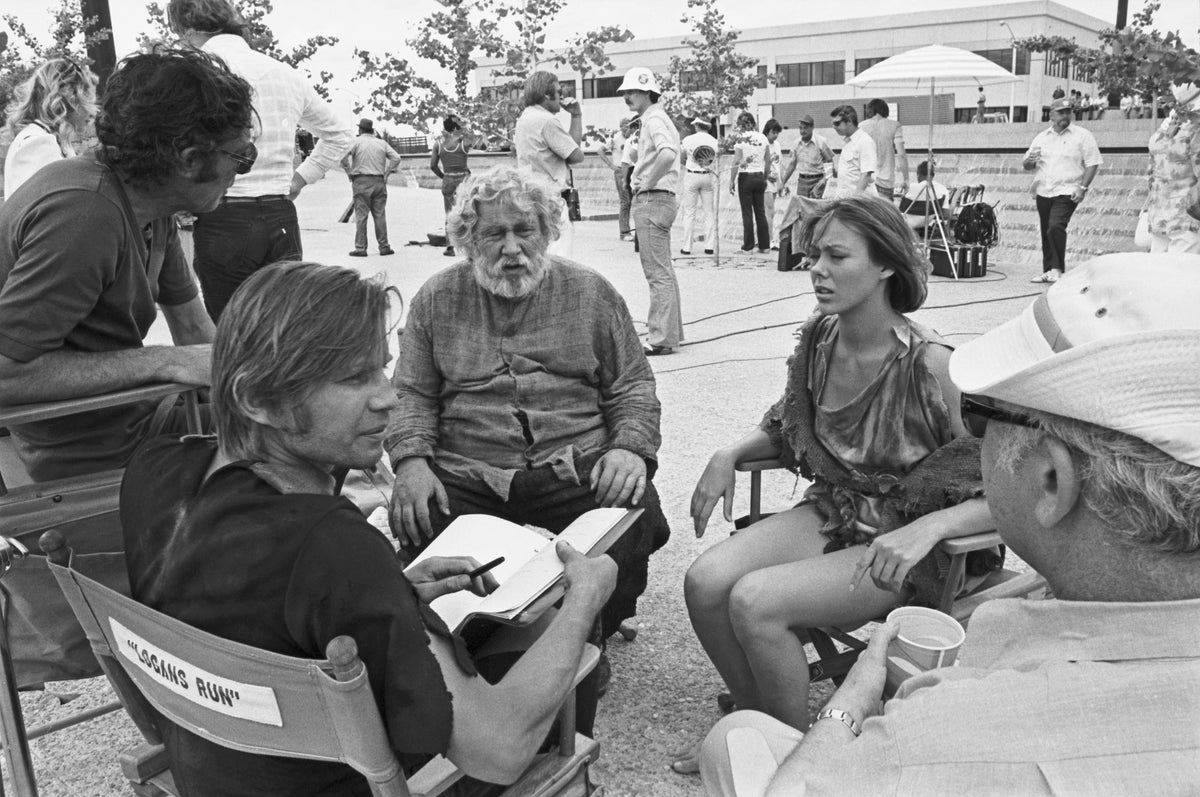 On the set of the movie Logan’s Run, at the Fort Worth Water Gardens, July 19, 1975. Star Michael York sits across from co-stars Peter Ustinov and Jenny Agutter. Producer Saul David David, left, marveled at the Water Gardens, “You could look the world over and not find a set as magnificent as this… Fort Worth should be proud of the people who gave it to the city.” Courtxesy Fort Worth Star-Telegram Collection, Special Collections, UT Arlington Libraries; photo by Gene Gordon