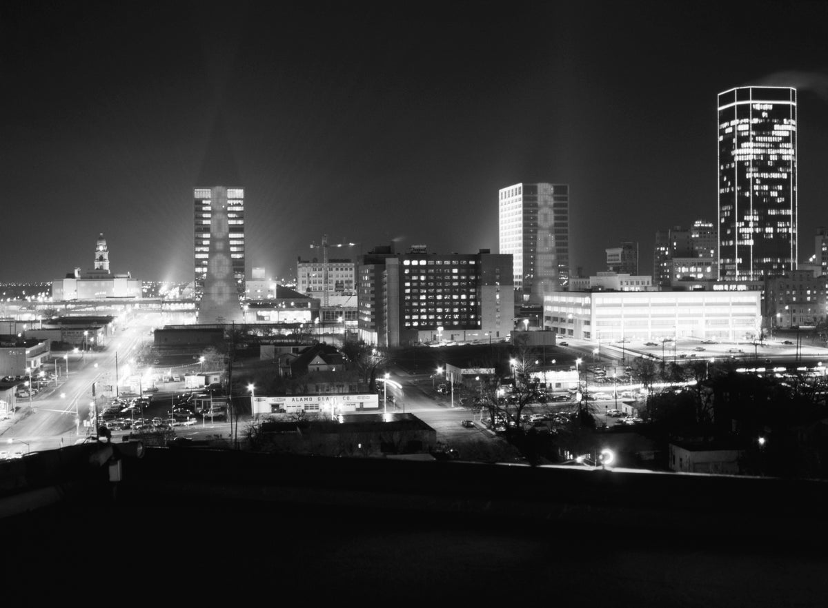 The message “Go, Go, Rodeo” displayed on the Tandy Center’s twin towers in downtown Fort Worth for the Southwestern Exposition and Fat Stock Show, January 1978. The Tarrant County Courthouse can be seen at left. Courtesy Fort Worth Star-Telegram Collection, Special Collections, UT Arlington Libraries; photo by Willis Knight ^^ center light rgba(0,0,0,0.3)