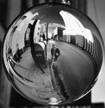 Self-portrait of photographer Winter Prather showing a Denver Street, 1955. COURTESY HISTORY COLORADO, #2000.300.11