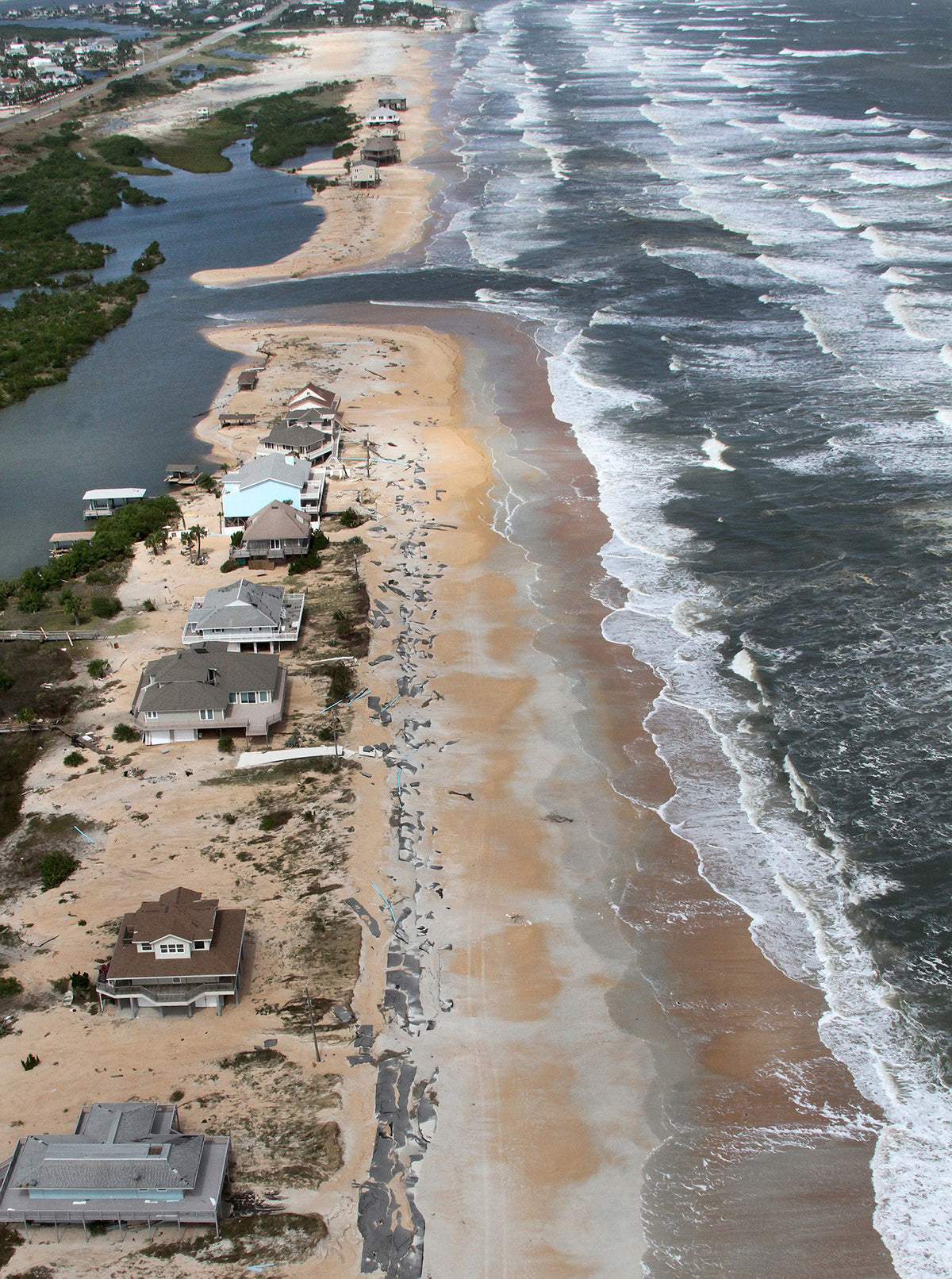 At the top of this photo, a new inlet created by Hurricane Matthew can be seen in the community of Summerhaven, just north of Flagler County. News-Journal/David Tucker