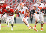 Clemson running back Zac Brooks (24) scores on a 35-yard pass play near N.C. State’s Shawn Boone during the 3rd quarter. Ken Ruinard / Anderson Independent Mail