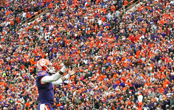 Clemson quarterback Deshaun Watson (4) waves to the crowd of orange and purple before kickoff with Wake Forest in Clemson. Ken Ruinard / Anderson Independent Mail
