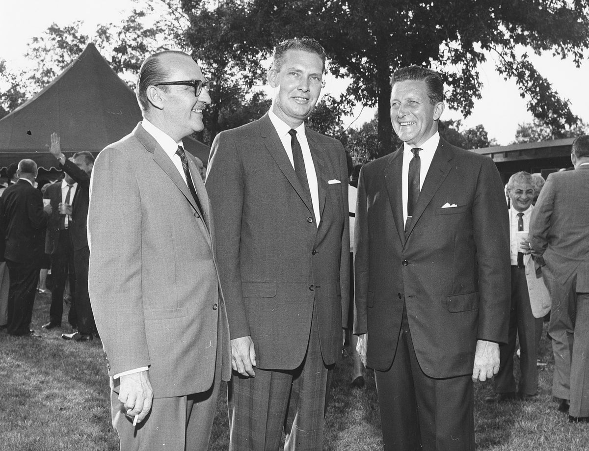 Mayor Lester Collins, center, stops for a snapshot with Jack Heitz, left, and Governor Otto Kerner in the 1960s.