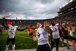 Cincinnati Bearcats quarterback Desmond Ridder (9) throws a ball into the stands in celebration after the NCAA football game on Saturday, Oct. 2, 2021, at Notre Dame Stadium in South Bend, Ind. Cincinnati Bearcats defeated Notre Dame Fighting Irish 24-13. The Enquirer