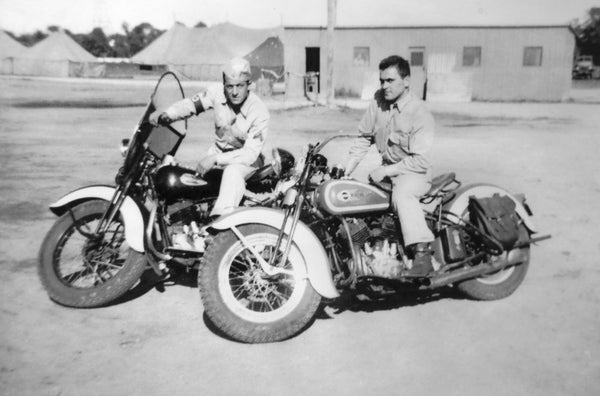During their hitch in the Army, Carmen Pariso, right, and his friend Frankie Arata found an opportunity to do a little motorcycle riding. Pariso recalls a German POW telling him, “You’re small but bad.”