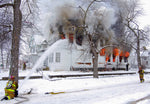 Sioux City firefighters working to battle a fire at 1523 Nebraska St. on Jan. 23, 2008. Four of eight units of the apartment building were occupied and all residents had been accounted for according to fire officials. Sioux City Journal