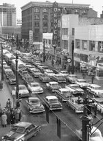 Downtown traffic at an all-time high as last-minute Christmas shoppers flooded stores up and down Sixteenth Street, Denver, December 24, 1956. COURTESY THE DENVER POST VIA GETTY IMAGES, BOB BEEGLE, #DPL_1593020