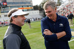 Georgia head coach Kirby Smart speaks with Georgia Tech head coach Paul Johnson before the start of a NCAA college football game between Georgia and Georgia Tech in Atlanta, Nov. 25, 2017. Joshua L. Jones, Athens Banner-Herald