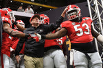 Georgia running back Prather Hudson (24), Georgia head coach Kirby Smart and Georgia center Lamont Gaillard (53) take the field before the College Football Playoff National Championship game between Georgia and Alabama on Jan. 8, 2017 in Atlanta, Ga. AJ Reynolds for the Athens Banner-Herald