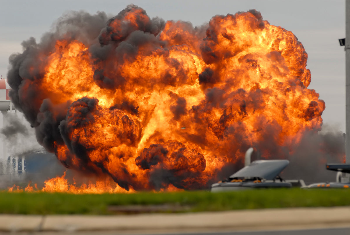 A single engine T-28 from the six-plane Trojan Horsemen Demonstration Flight Team crashes and explodes during a performance at the Thunder Over the Blue Ridge Open House and Air Show, at the 167th Airlift Wing in Martinsburg, September 17, 2011. The Journal Newspaper