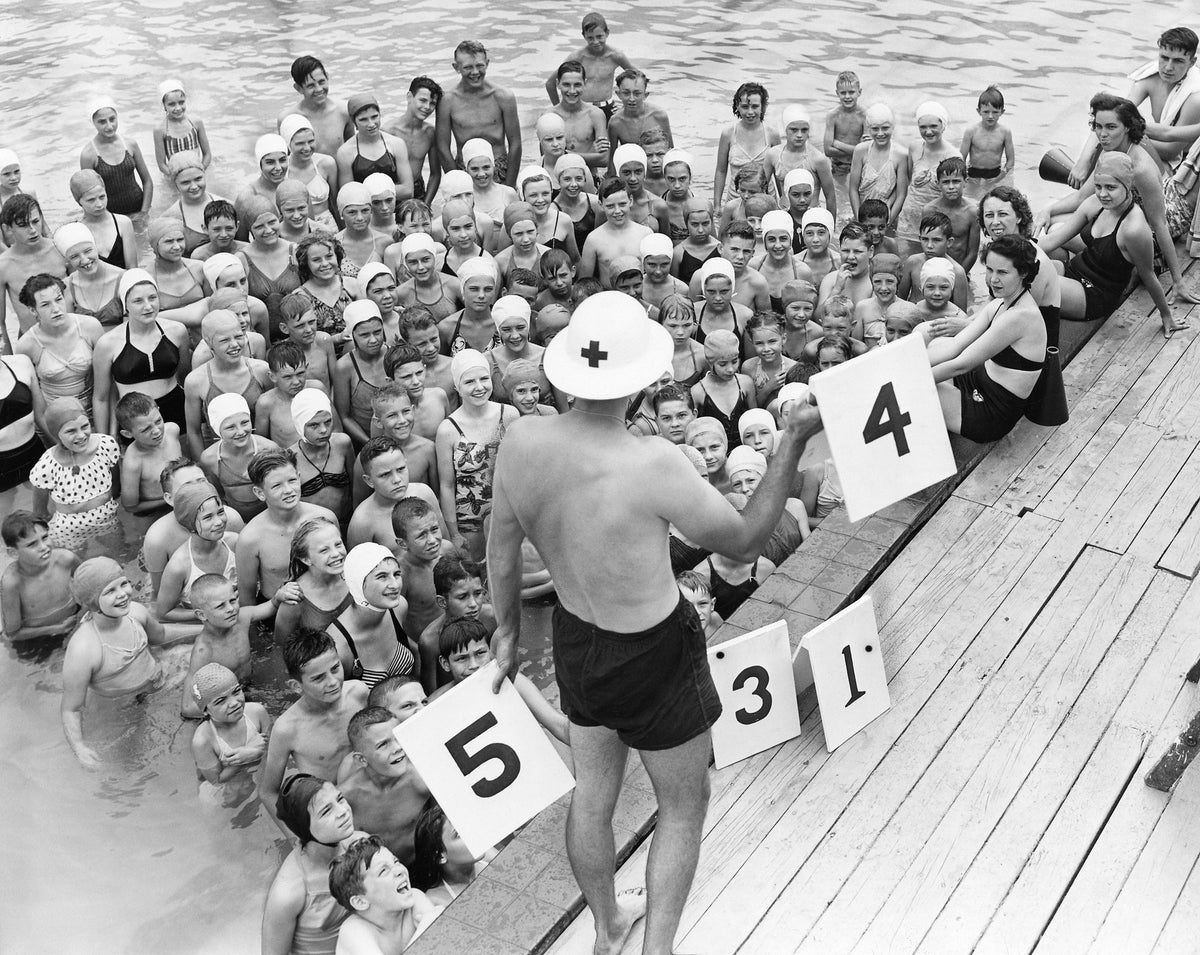 Red Cross swimming instructor Clarence E. Hall teaches a children’s class at Summit Beach Park’s Crystal Pool, Akron, June 30, 1949. Courtesy Akron Beacon Journal
