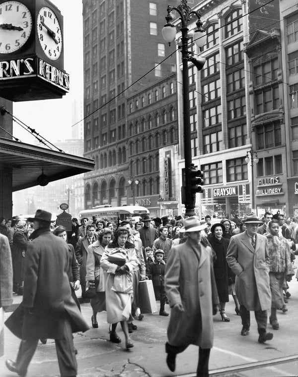 Pedestrians crowd the sidewalks of Woodward Avenue in downtown Detroit in the late 1940s. The city reached its peak population of 1.8 million people in 1950, and has lost residents in every decade since. The Detroit News