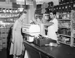 The Detroit NewsJohn Abdella assists Brenda Chips with her order at Eastern Market in 1955. The Detroit News