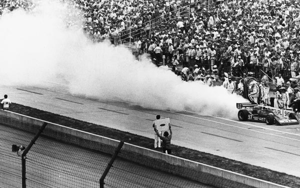 Sheldon Kinser's smoking car comes into the pits after only 14 laps.