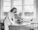 Martha Anne Woodrum (later Mrs. Jack Zillhardt) in her office at Woodrum Field (later known as Roanoke Regional Airport), circa 1949. Soon after becoming a licensed pilot circa 1940, Martha Anne operated a flight school and charter service and later an aircraft sales and service operation at Woodrum Field. She was the first woman in Virginia to earn an instrument rating. Courtesy Historical Society of Western Virginia / #1990.69.655
