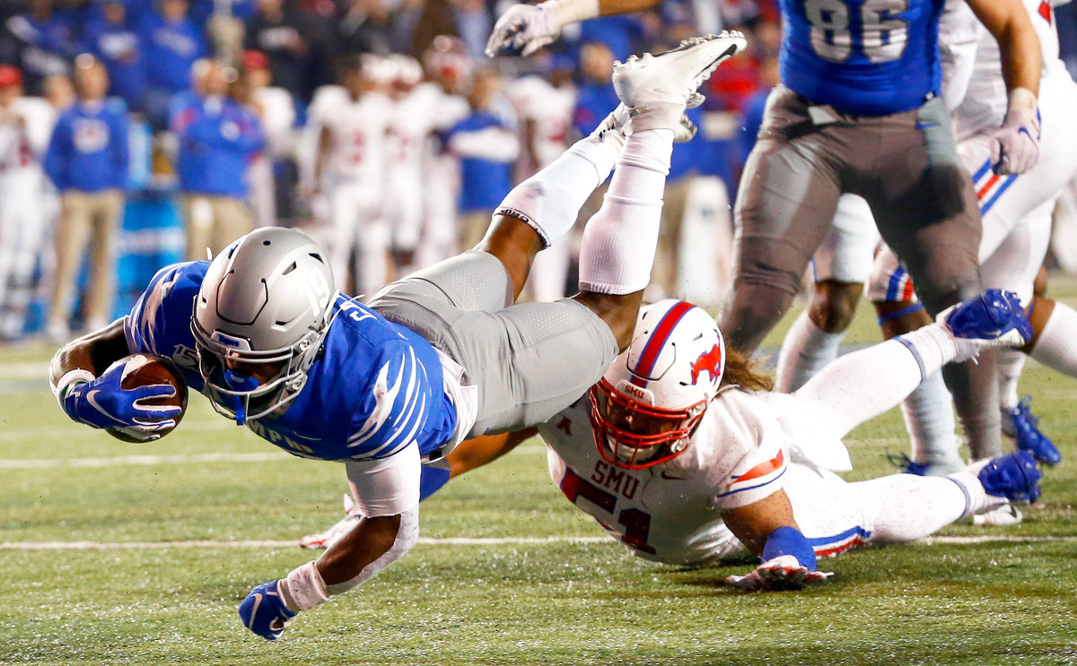 Memphis running back Kenneth Gainwell dives forward for extra yards. Courtesy Joe Rondone / The Commercial Appeal