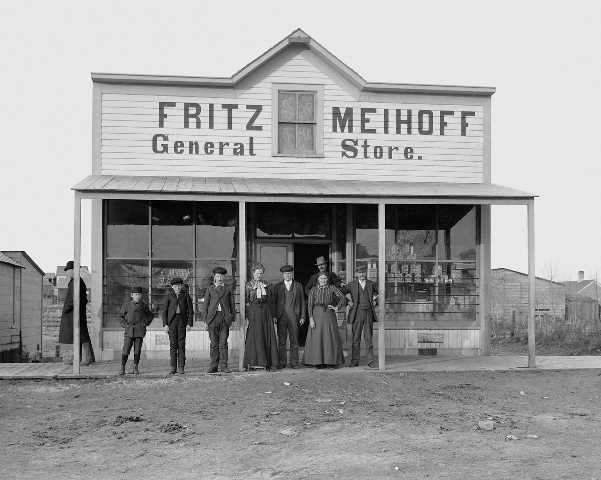 The Meihoff family standing in front of the Fritz Meihoff General Store, Mandan. Courtesy State Historical Society of North Dakota / #2011-P-002-02314