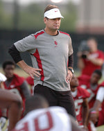 Oklahoma head coach Bob Stoops watches as the Sooners warm up, Thursday, Aug. 4, 2011, during the first practice of the season. Transcript photo by Jerry Laizure