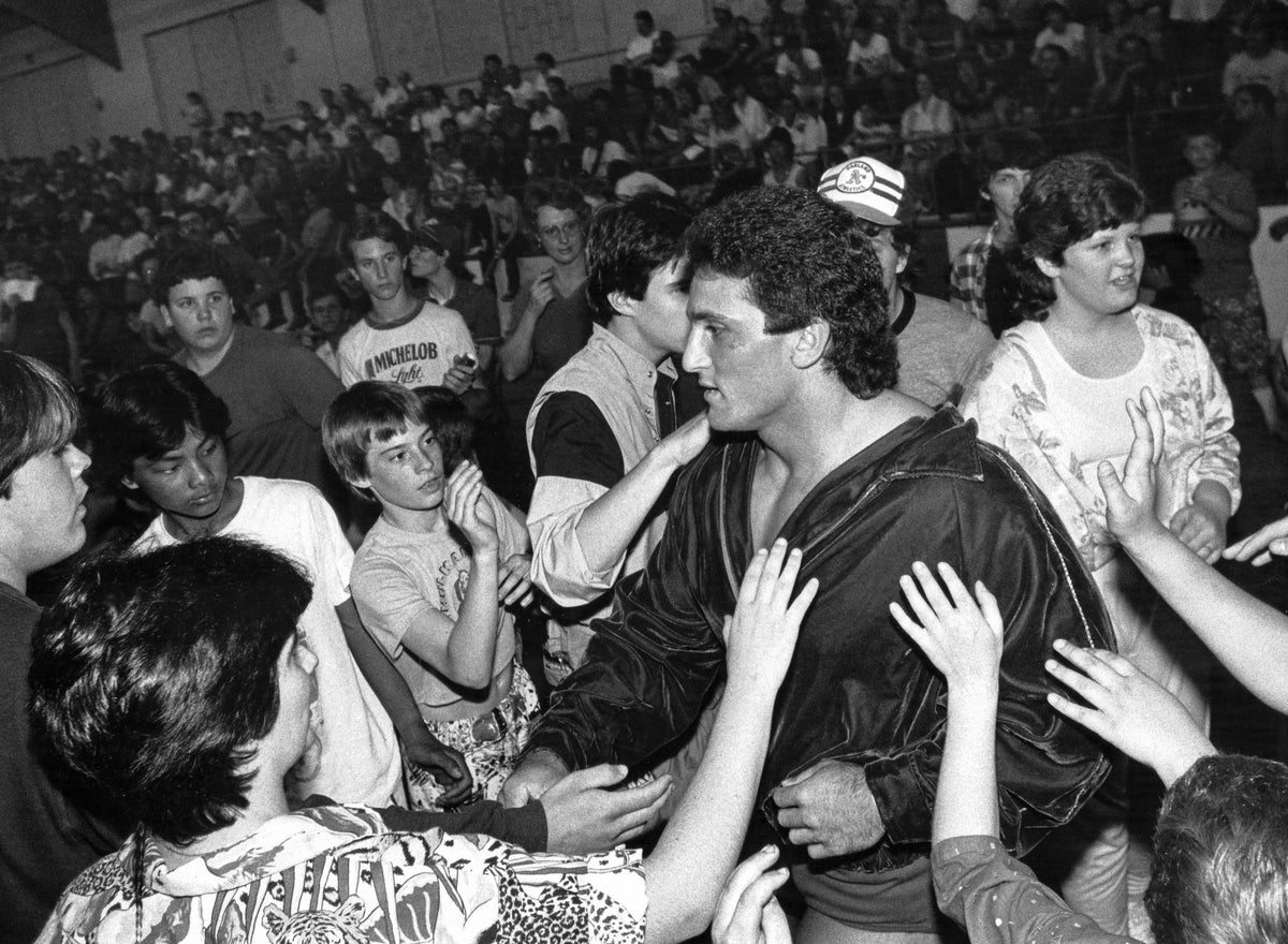 Paul Roma makes his way to the stage for a tag team engagement as part of a World Wrestling Federation event at the J.F.K. Coliseum in May of 1987. Photo by Bob LaPree. Courtesy Union Leader Archives