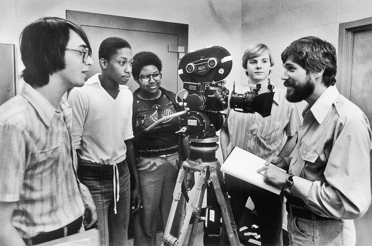 Students from Huguenot High School in Richmond working with director Dave Anderson on a public television series called As We See It, April 1978. Financed by a federal grant, the series shed light on school desegregation across America, with students contributing scripts for scenes. The Huguenot segment was titled “The Riot that Never Was” and included a re-enactment of a tense moment in the cafeteria during the previous school year, which ultimately was resolved. Courtesy Richmond Times-Dispatch