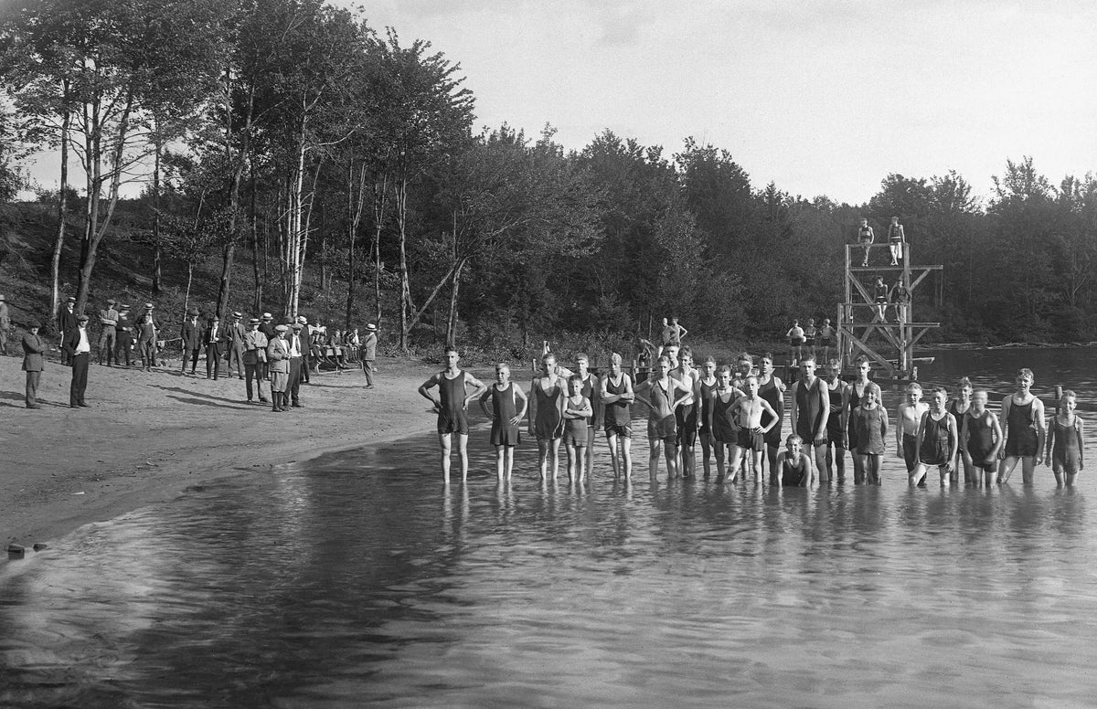 Rome and Verona Boy Scouts at Camp Kingsley on August 5, 1921. A group of Rome Rotarians are standing on the shore. Courtesy Rome Historical Society / #2018.2.2.497