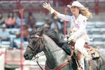 Miss Frontier Bailey Bishop waves to the crowd while being introduced at Frontier Park. Michael Cummo / Wyoming Tribune Eagle