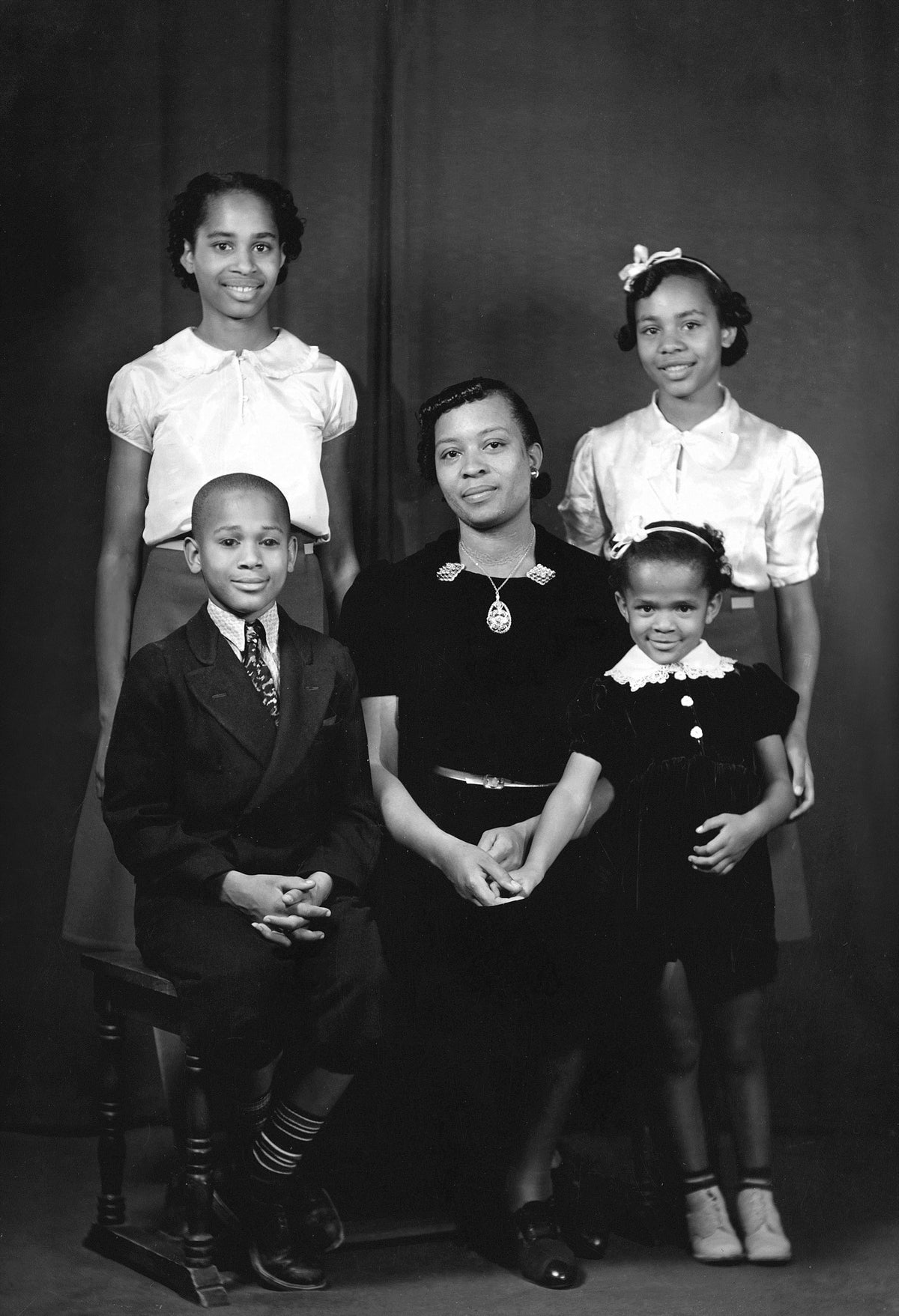 Fannie (Hopkins) Allen and her children Delora Jene, Frances Lorraine, John Hopkins, and Columbe Virginia on December 11, 1939. Fannie married longtime Mission Inn employee John Allen on May 15, 1925. Courtesy Avery E. Field photographs (MS 146). Special Collections & University Archives, University of California, Riverside