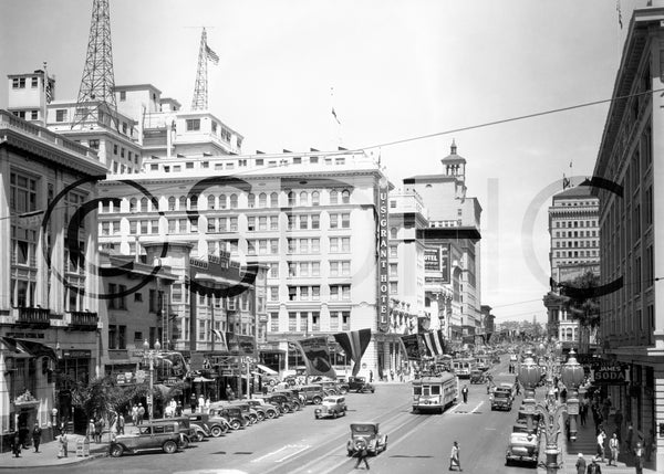 Looking east on Broadway at 2nd Avenue. U.S. Grant Hotel is pictured in the center of the frame. San Diego History Center (#Sensor 8-240)