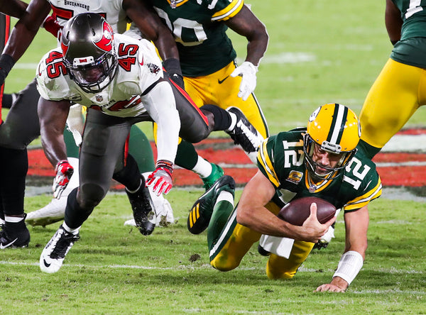 Devin White is part of a sack-happy day for the Bucs defense, which gets to Packers quarterback Aaron Rodgers four times during the regular-season matchup. TAMPA BAY TIMES / DIRK SHADD