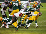 Linebacker Shaquil Barrett sacks Packers quarterback Aaron Rodgers multiple times during the NFC Championship Game. TAMPA BAY TIMES / DIRK SHADD