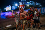Shirts are optional when it comes to celebrating the hometown team outside Raymond James Stadium after Super Bowl 55. TAMPA BAY TIMES / IVY CEBALLO