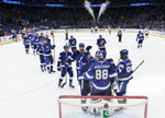 Tampa Bay Lightning goaltender Andrei Vasilevskiy (88) is congratulated by his team as they shut out the Florida Panthers and win 4-0 to take the series in game six of the first round of the NHL Stanley Cup Playoffs at Amalie Arena on May 26, 2021, in Tampa. Dirk Shadd / Tampa Bay Times