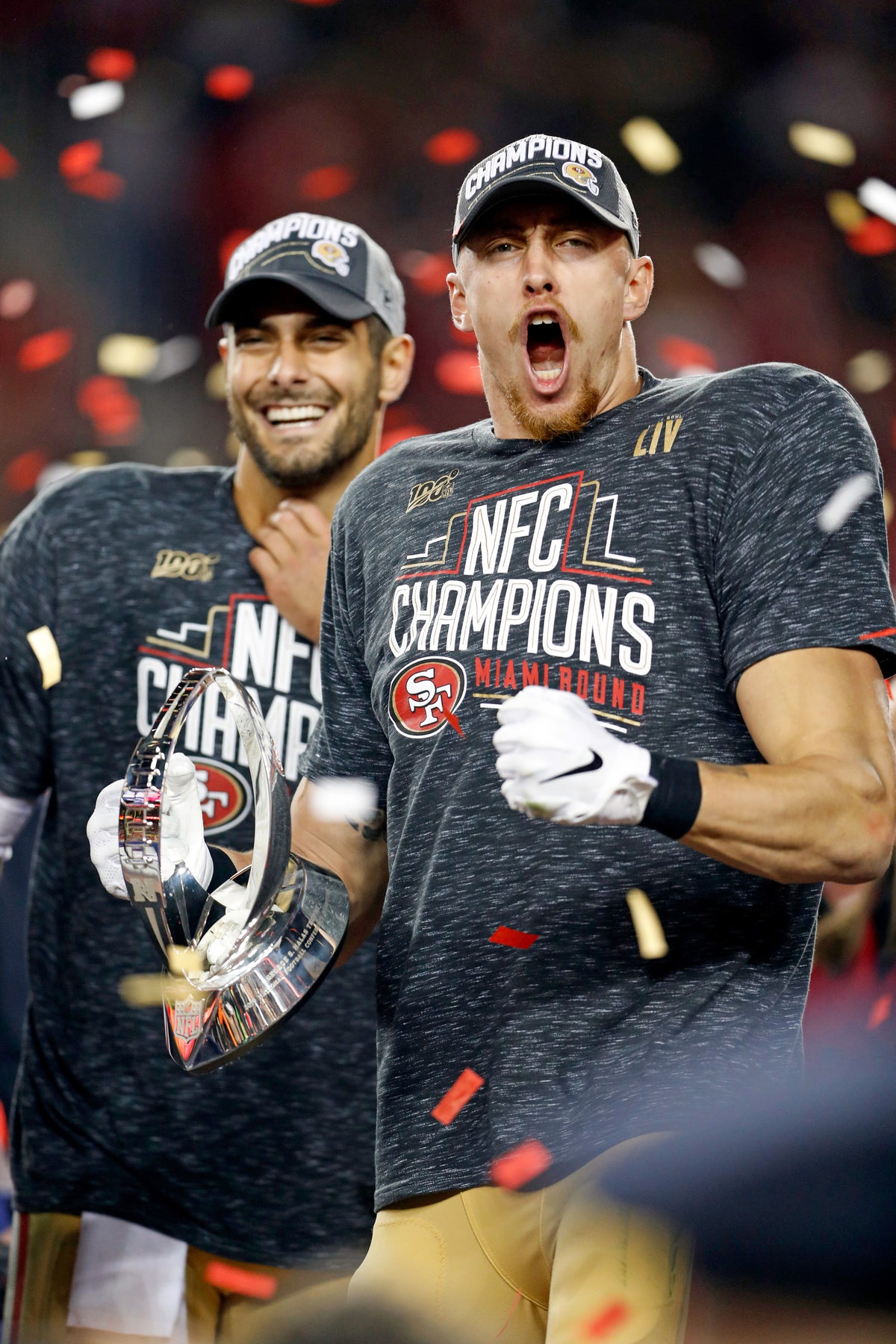 San Francisco 49ers' George Kittle and Jimmy Garoppolo after the Niners' 37-20 win over the Green Bay Packers in the NFC Championship Game at Levi's Stadium in Santa Clara, Calif., on Jan. 19, 2020. Scott Strazzante/The Chronicle