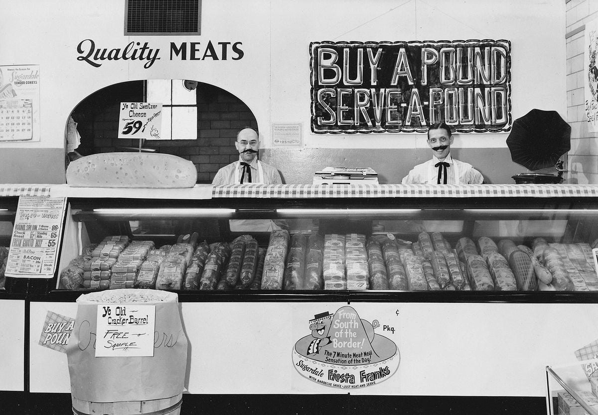 Owner John Fouch on the right with unknown employee in his self-serve food store, northwest corner of South Main Street and West Chestnut Street, Orrville, 1951. The building presently houses Bob Snyder Auto Exchange. Courtesy The John Fouch Family
