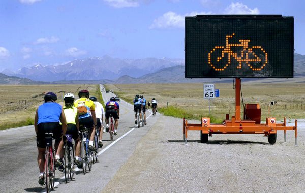 Cyclists are greeted with a telling sign as they climb toward the Mineral Hot Springs and make their way toward Salida.