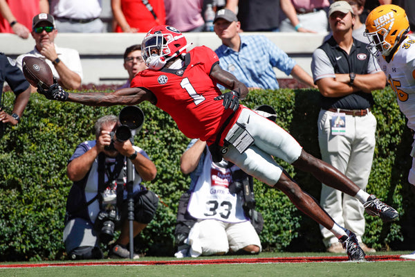 Georgia wide receiver Marcus Rosemy-Jacksaint (1) tries to bring in a pass from Georgia quarterback Stetson Bennett during the first half. Joshua L. Jones / Athens Banner-Herald