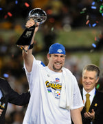 Pittsburgh Steelers quarterback Ben Roethlisberger raises the Vince Lombardi trophy as Steelers president Art Rooney II applauds after the Super Bowl XLIII at Raymond James Stadium in Tampa, Fla., on Feb. 1, 2009. Matt Freed/Post-Gazette