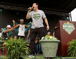 Baylor men's basketball head coach Scott Drew gets fired up with the crowd at a parade. Drew is in his 18th year at the helm for the Bears. Courtesy Jerry Larson / Waco Tribune-Herald