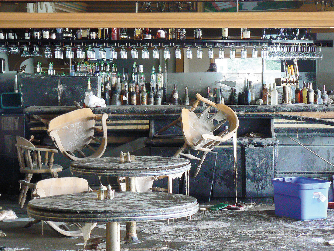 The Souris River destroyed much of the Minot Country Club's main clubhouse, including these tables and chairs in the dining room.