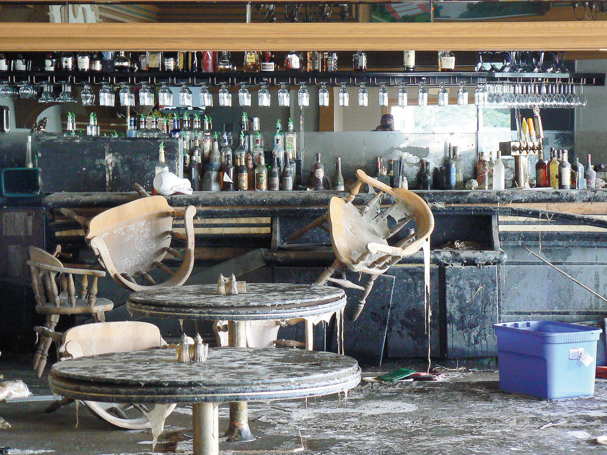The Souris River destroyed much of the Minot Country Club's main clubhouse, including these tables and chairs in the dining room.