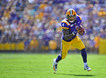 LSU running back John Emery Jr. (4) runs the ball against Utah State in the first half on Oct. 5, 2019, at Tiger Stadium in Baton Rouge, La. Courtesy Hilary Scheinuk/The Advocate